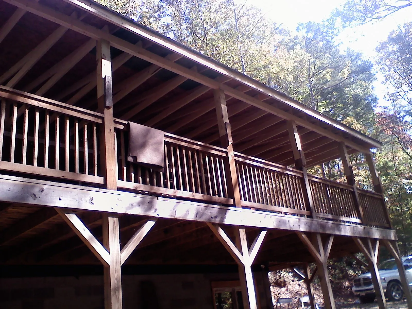 Timber framing under a new elevated porch and deck — Roof Leak Repair in Brewerton by Roofing Brothers